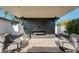 Cozy outdoor living space with fireplace, perfect for entertaining friends and Gathering at 14012 N 57Th Pl, Scottsdale, AZ 85254