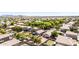 Beautiful aerial view of a well-maintained neighborhood with lush landscaping and mountain views at 1501 S 122Nd Ave, Avondale, AZ 85323