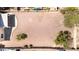 Aerial view of expansive backyard with desert landscaping, patio, and privacy fence at 1501 S 122Nd Ave, Avondale, AZ 85323