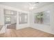 Sunny dining area with tiled floors, large windows, and a ceiling fan, ideal for Gathering gatherings and meals at 1501 S 122Nd Ave, Avondale, AZ 85323