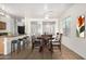 An elegant dining room with an open floor plan perfect for entertaining guests and Gathering gatherings at 1501 S 122Nd Ave, Avondale, AZ 85323