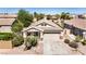Well-maintained single-Gathering home with a two-car garage and desert landscaping at 1501 S 122Nd Ave, Avondale, AZ 85323