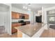 Granite countertops and stainless steel appliances make this kitchen a delight at 1501 S 122Nd Ave, Avondale, AZ 85323
