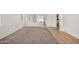 Bright, carpeted living room with tiled entryway and plenty of natural light at 1501 S 122Nd Ave, Avondale, AZ 85323