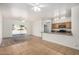 Spacious living area featuring tiled floors and sliding glass doors to the backyard at 1501 S 122Nd Ave, Avondale, AZ 85323