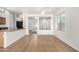Open-concept living room boasts tile floors and bright, neutral-toned walls at 1501 S 122Nd Ave, Avondale, AZ 85323