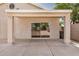 Covered patio with sliding glass doors provides seamless indoor-outdoor living and entertaining at 1501 S 122Nd Ave, Avondale, AZ 85323