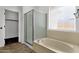Bathroom with tile floors, shower, and tub combo at 1641 W Windsong Dr, Phoenix, AZ 85045