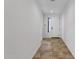 Bright entryway featuring neutral tile flooring and a view to the front door at 1641 W Windsong Dr, Phoenix, AZ 85045