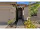 Inviting front entrance with desert landscaping and a walkway leading to the front door at 1641 W Windsong Dr, Phoenix, AZ 85045