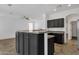 Open concept kitchen with lots of counter space and seamless flow to the living area at 1641 W Windsong Dr, Phoenix, AZ 85045
