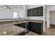 Well-equipped kitchen featuring stainless steel appliances, countertops, and bar stool seating at 1641 W Windsong Dr, Phoenix, AZ 85045