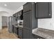 Open kitchen layout with stainless steel appliances and plenty of cabinet storage at 1641 W Windsong Dr, Phoenix, AZ 85045