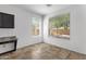Office with tile floors, built in desk, and bright windows overlooking the well maintained landscaping at 1641 W Windsong Dr, Phoenix, AZ 85045