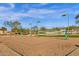 Community sand volleyball court provides a recreational area for residents at 1641 W Windsong Dr, Phoenix, AZ 85045