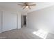 Bedroom includes closet and views to an ensuite at 16609 S 41St St, Phoenix, AZ 85048