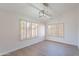 Dining room featuring vinyl plank flooring, modern lighting, and plantation shutters at 16609 S 41St St, Phoenix, AZ 85048