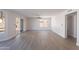 Living room with luxury vinyl plank flooring and sliding glass door to backyard at 16609 S 41St St, Phoenix, AZ 85048