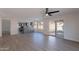 Open living space with vinyl plank flooring connecting the living room and kitchen at 16609 S 41St St, Phoenix, AZ 85048