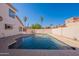 Backyard features a refreshing swimming pool, surrounded by patio at 16609 S 41St St, Phoenix, AZ 85048