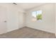 Bright bedroom featuring a window and closet at 1727 W 12Th Ave, Apache Junction, AZ 85120