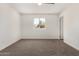 Cozy bedroom showcasing a window and neutral color palette at 1727 W 12Th Ave, Apache Junction, AZ 85120