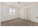 Charming bedroom with closet and window at 1727 W 12Th Ave, Apache Junction, AZ 85120
