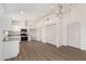 Modern kitchen featuring stainless steel appliances, stylish cabinets and granite countertops at 1727 W 12Th Ave, Apache Junction, AZ 85120