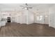 Open-concept living space featuring modern lighting and stylish new flooring at 1727 W 12Th Ave, Apache Junction, AZ 85120