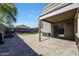 Outdoor patio with a view of the backyard, with a built-in grill at 17426 W Calavar Rd, Surprise, AZ 85388