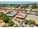 An aerial view of a residential neighborhood featuring mature landscaping and neighborhood streets at 17805 W Arizona Dr, Surprise, AZ 85374