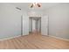 Spacious bedroom featuring wood-look floors and open doorway at 17805 W Arizona Dr, Surprise, AZ 85374