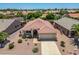 An aerial view of a single-Gathering home featuring desert landscaping and a two-car garage at 17805 W Arizona Dr, Surprise, AZ 85374