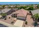 An aerial view of a single-Gathering home featuring desert landscaping and a two-car garage at 17805 W Arizona Dr, Surprise, AZ 85374