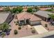 An aerial view of a single-Gathering home featuring desert landscaping and a two-car garage at 17805 W Arizona Dr, Surprise, AZ 85374