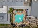 Aerial shot featuring a lagoon style pool, palm trees, and outdoor lounging at 17805 W Arizona Dr, Surprise, AZ 85374