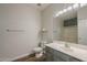 Bathroom featuring vanity with ample counter space, toilet, and glass enclosed shower at 1886 E Don Carlos Ave # 136, Tempe, AZ 85281