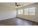 Bedroom featuring wood-style flooring, natural light and a ceiling fan at 1886 E Don Carlos Ave # 136, Tempe, AZ 85281