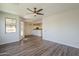 Living Room featuring wood-style floors leading into an open floor plan at 1886 E Don Carlos Ave # 136, Tempe, AZ 85281