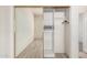 Spacious closet with sliding mirrored doors, shelves, and a hanging rod for organized storage at 205 N 74Th St # 110, Mesa, AZ 85207