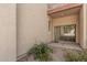 View of the private patio area showing desert landscape and sliding glass door entry at 205 N 74Th St # 110, Mesa, AZ 85207