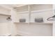 Spacious walk-in closet with built-in shelves and wooden rods for ample and organized storage at 205 N 74Th St # 110, Mesa, AZ 85207