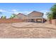Large backyard featuring a brick pathway, ideal for creating your dream outdoor oasis at 2421 S 65Th Dr, Phoenix, AZ 85043