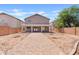 Expansive backyard with brick pathway, offers great potential for landscaping and outdoor activities at 2421 S 65Th Dr, Phoenix, AZ 85043