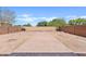 Spacious backyard featuring a brick pathway, perfect for outdoor entertaining and gardening at 2421 S 65Th Dr, Phoenix, AZ 85043