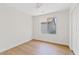 Well-lit room with window and closet, offering a comfortable and functional space at 2421 S 65Th Dr, Phoenix, AZ 85043
