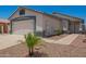 Charming single-story home with well-maintained landscaping and an attached two-car garage at 3014 W Zachary Dr, Phoenix, AZ 85027