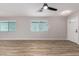 Spacious living room with new hardwood floors, recessed lighting, and large windows at 3014 W Zachary Dr, Phoenix, AZ 85027