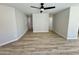 Spacious living room showcasing wood flooring and a neutral color palette at 3014 W Zachary Dr, Phoenix, AZ 85027
