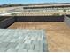 Large backyard, ready for landscaping, with a patio for outdoor entertaining at 31762 N Bandit Rd, San Tan Valley, AZ 85143